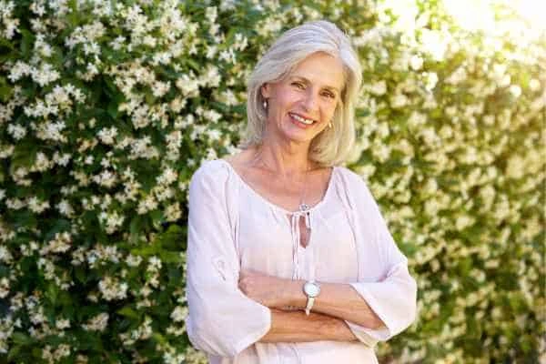 Older woman happy with urinary incontinence treatment Maplehurst
